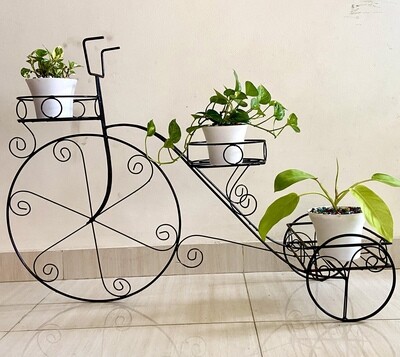 Ricksha planter with plants