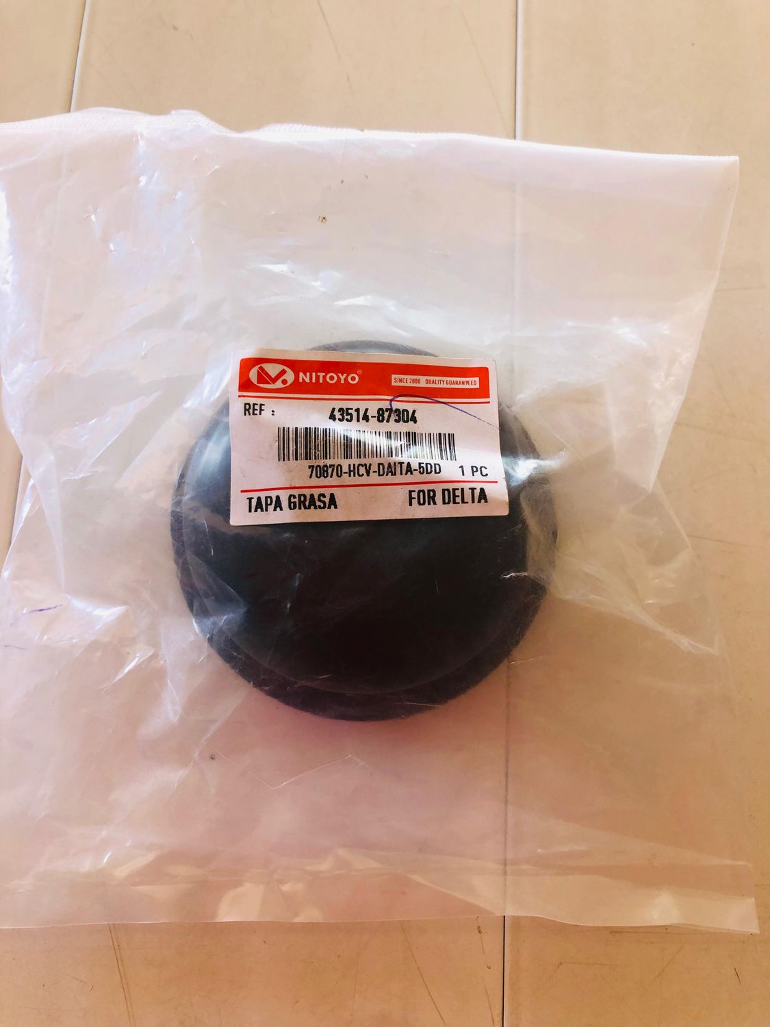 TAPA GRASA DAIHATSU  43514-87304