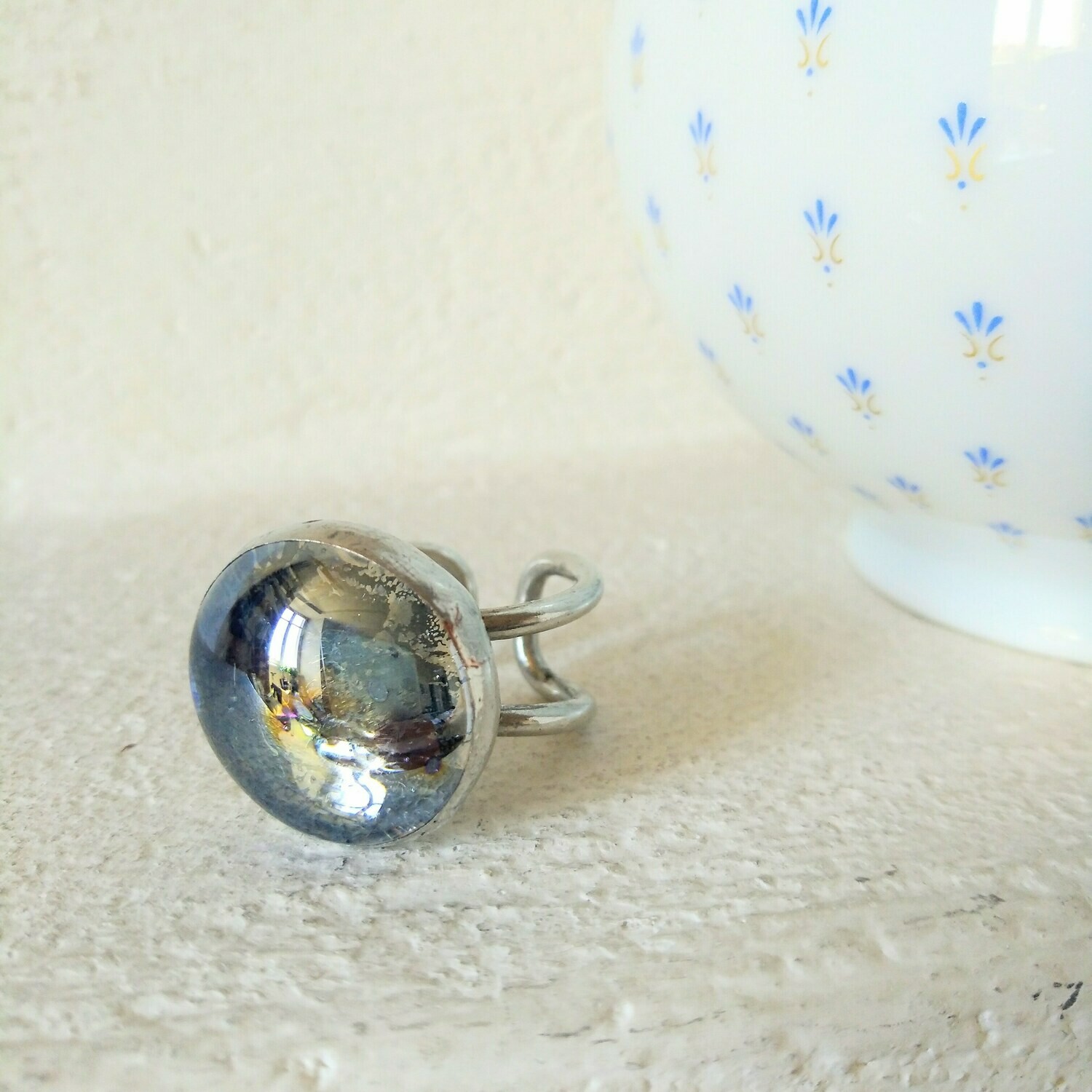 Anello Goccia 
celeste iridescente