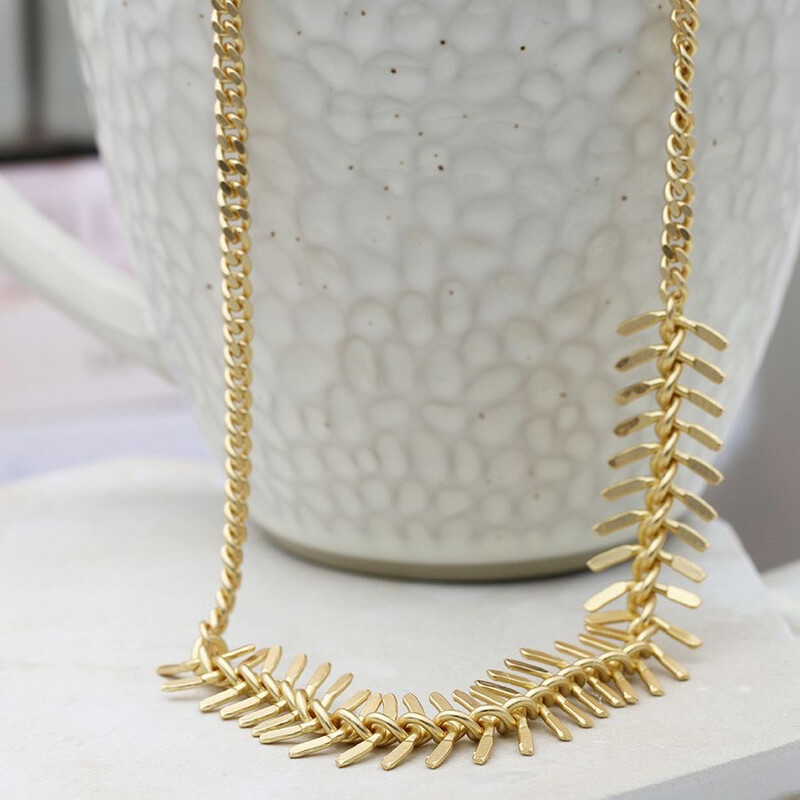 Faux gold plated chain and chevron necklace By POM