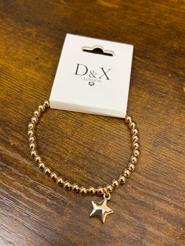 Gold Star Elasticated Bracelet By D&amp;X London