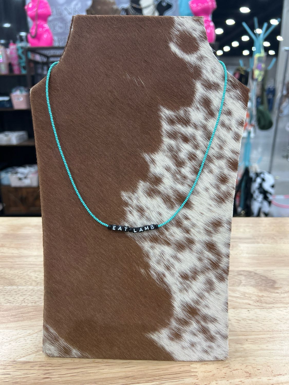 Turquoise Seed Bead “Eat Lamb”