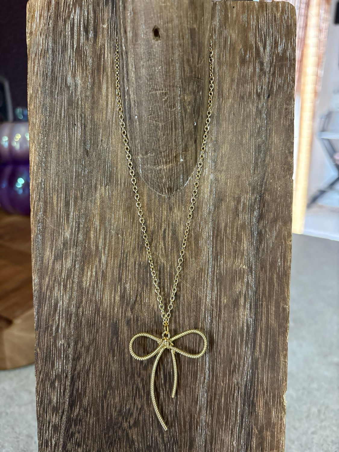 Gold Bow Charm Necklace