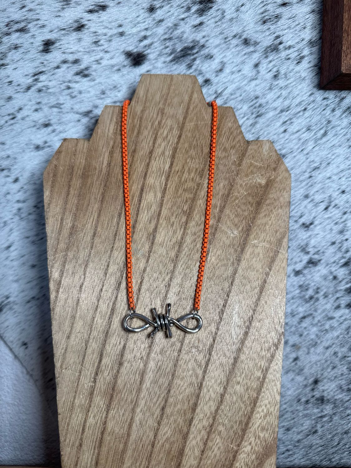 Barbed Wire with Orange Chain