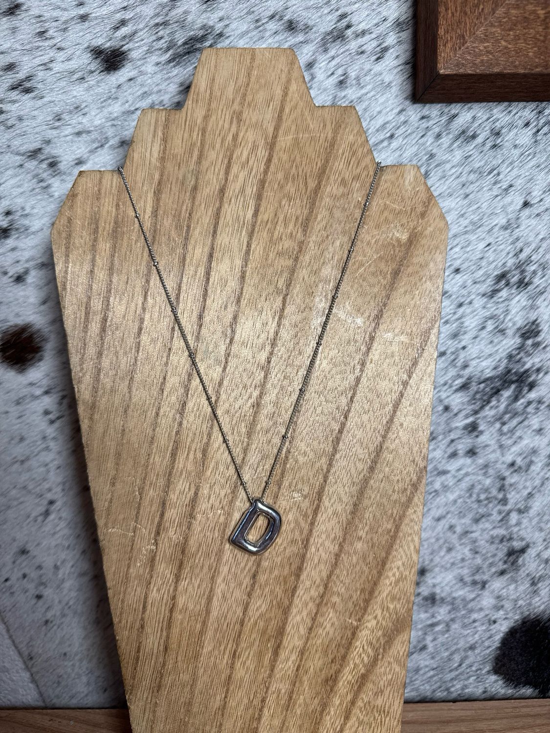 “D” Silver Charm