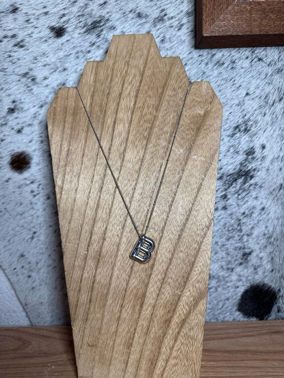 “B” Silver Charm