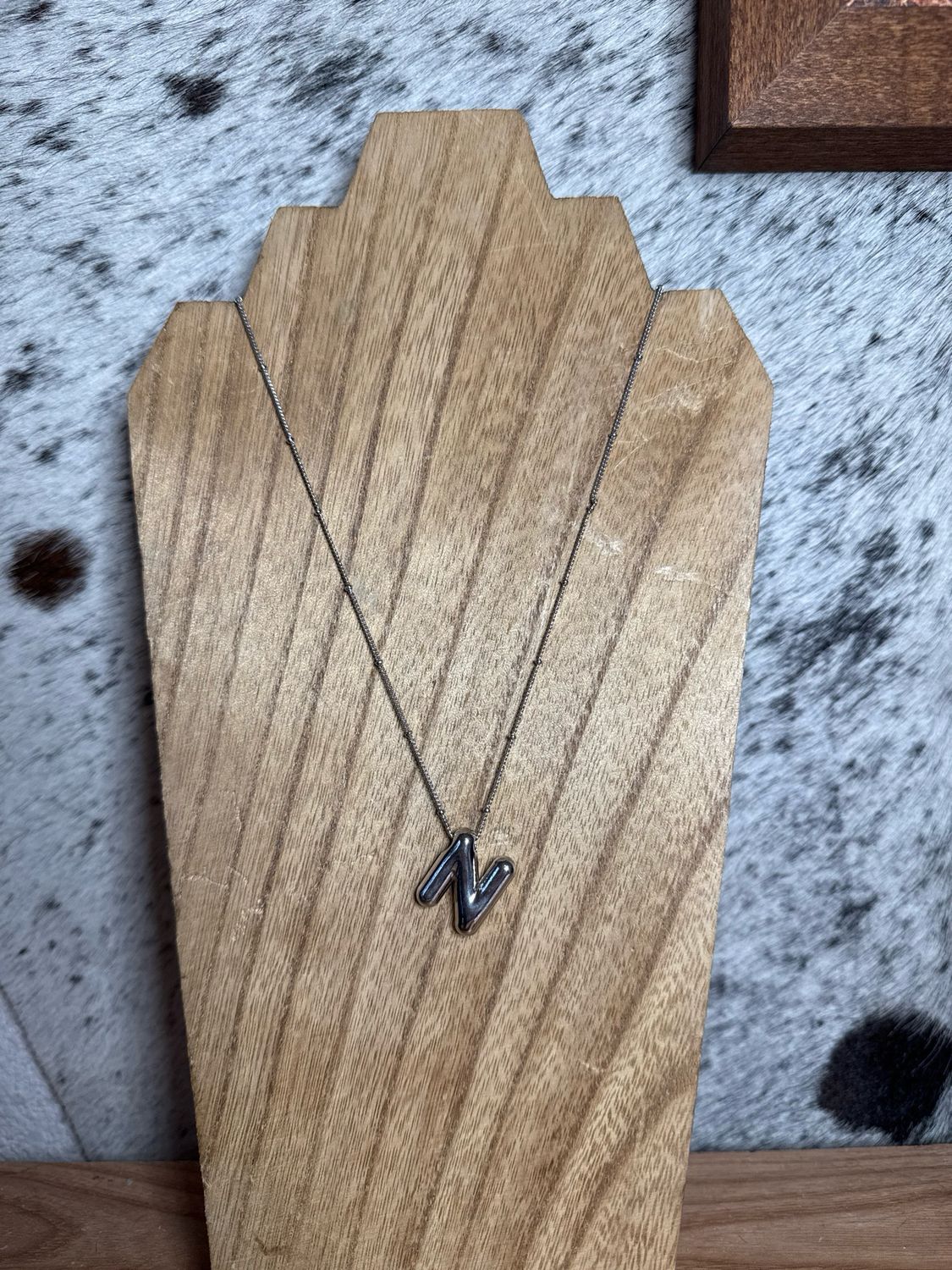 “N” Silver Charm