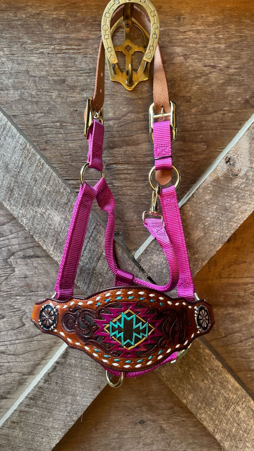 Hand Tooled And Painted Leather Bronc Noseband.  White And Turquoise Buckstitch.  Back Is Leather Lined. Mounted On A Weaver Adjustable Break-Away Halter Small Horse Size, Raspberry Color.