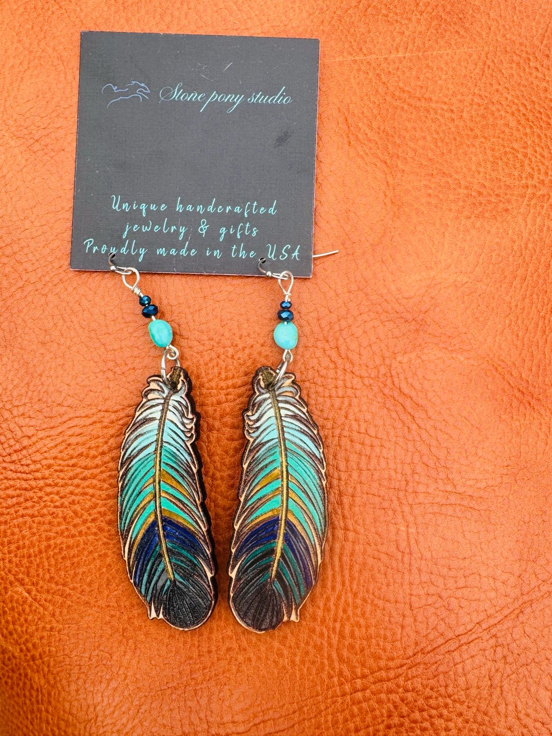 Leather feather earrings