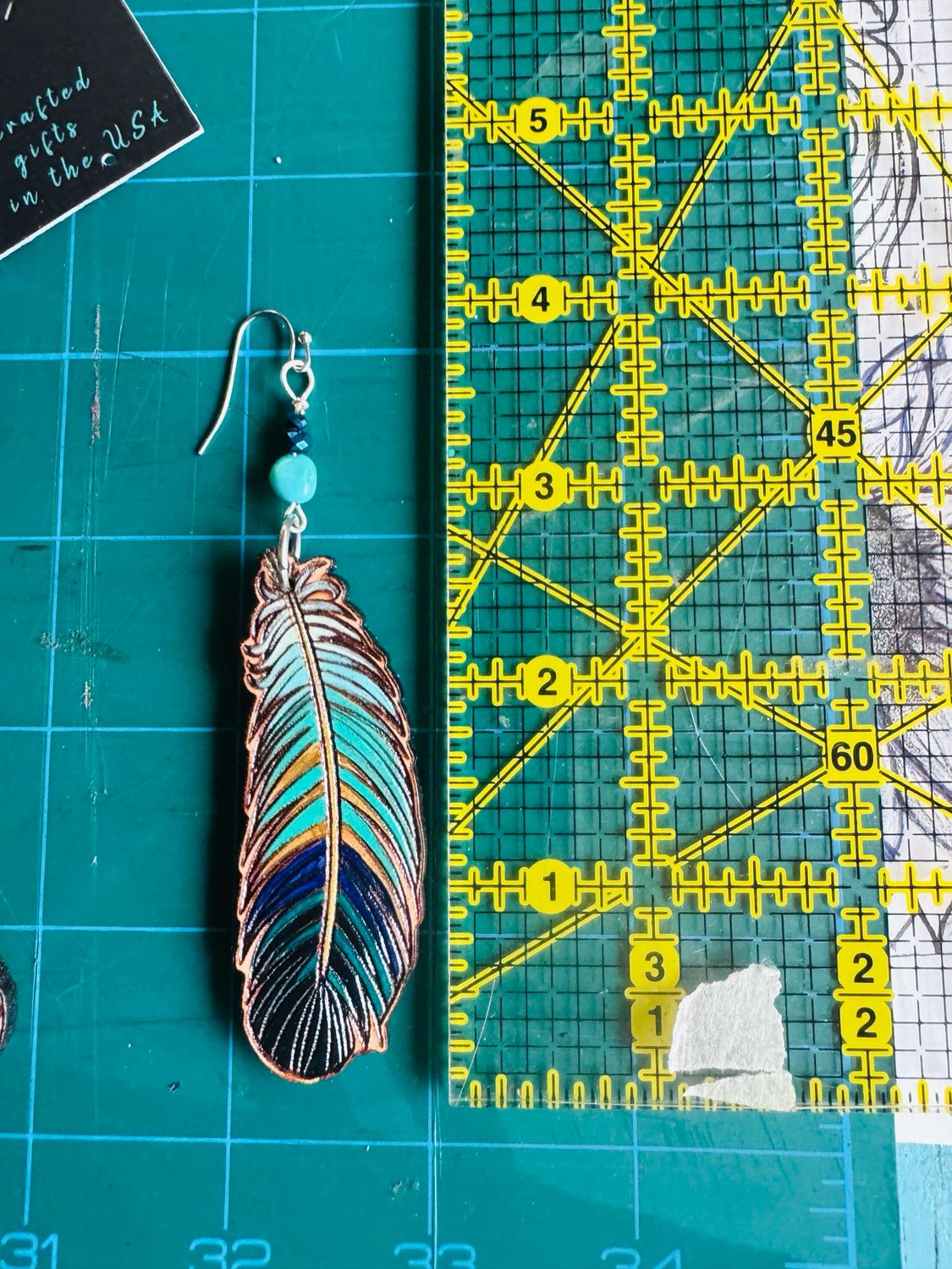 Leather feather earrings