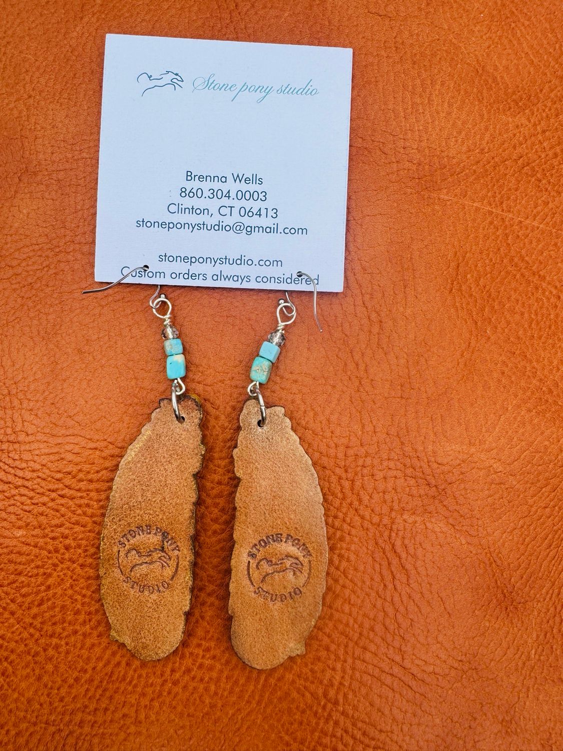 Leather feather earrings