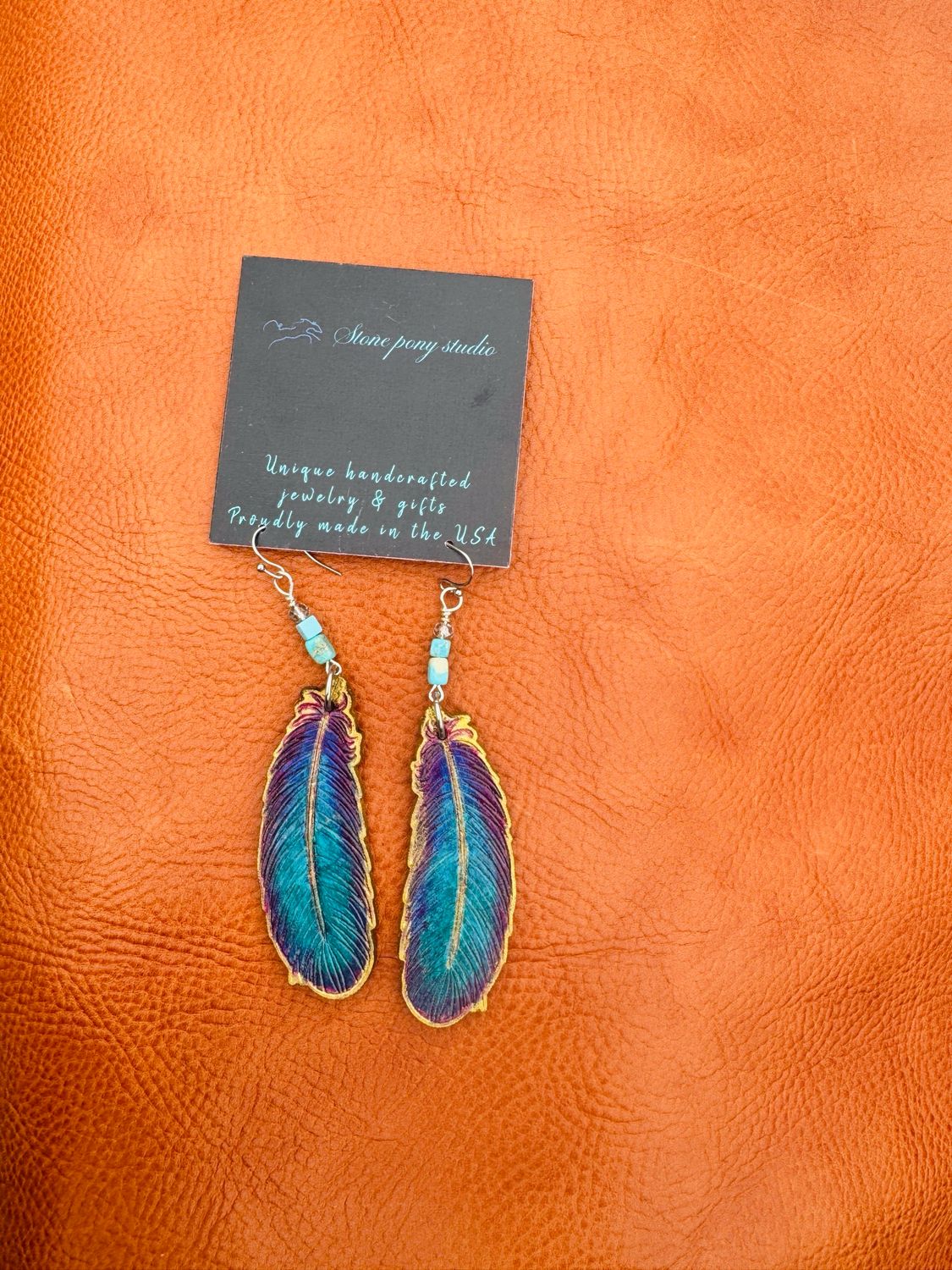 Leather feather earrings