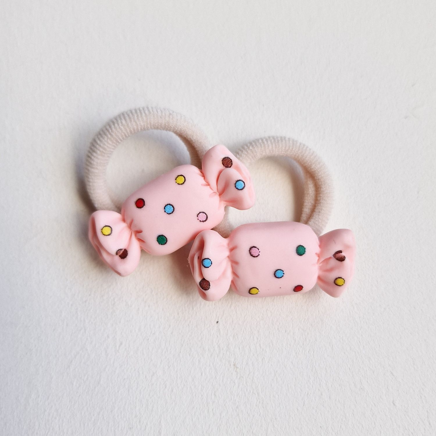 Haarelastiekjes snoepjes licht roze - set a 2 stuks