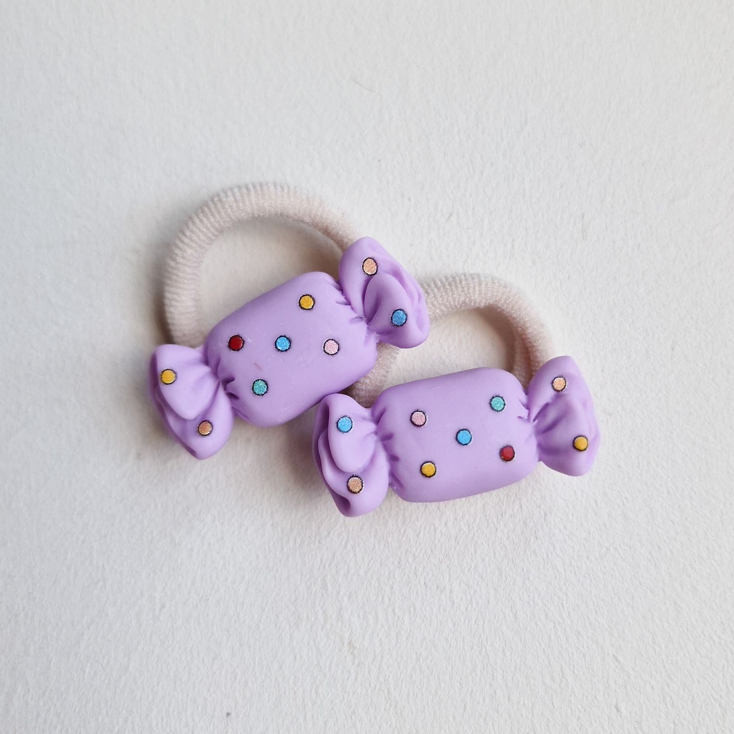 Haarelastiekjes snoepjes lila - set a 2 stuks Haarelastiekjes snoepjes lila - set a 2 stuks