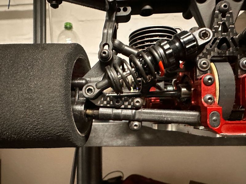 Rear lower shock mount carbon