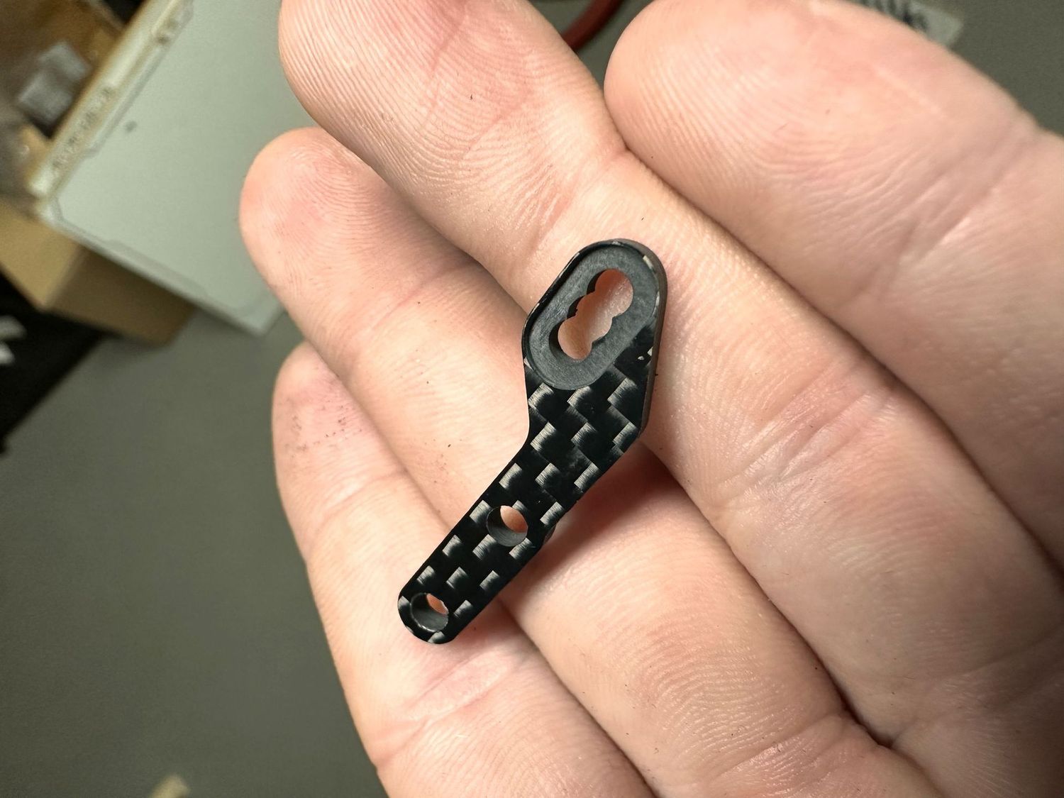 Rear lower shock mount carbon