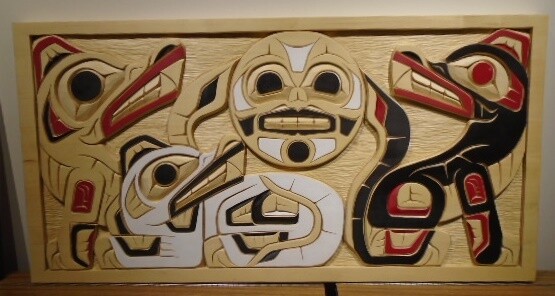 Wolf Pack by Simon Louie, yellow cedar, 40&quot; long