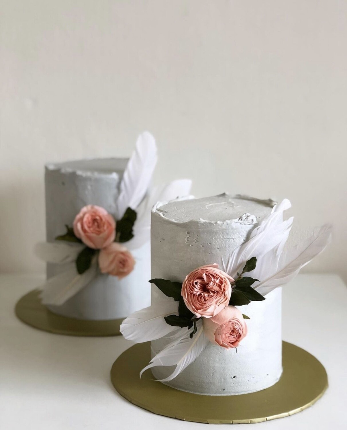 Feathers On Grey Cake