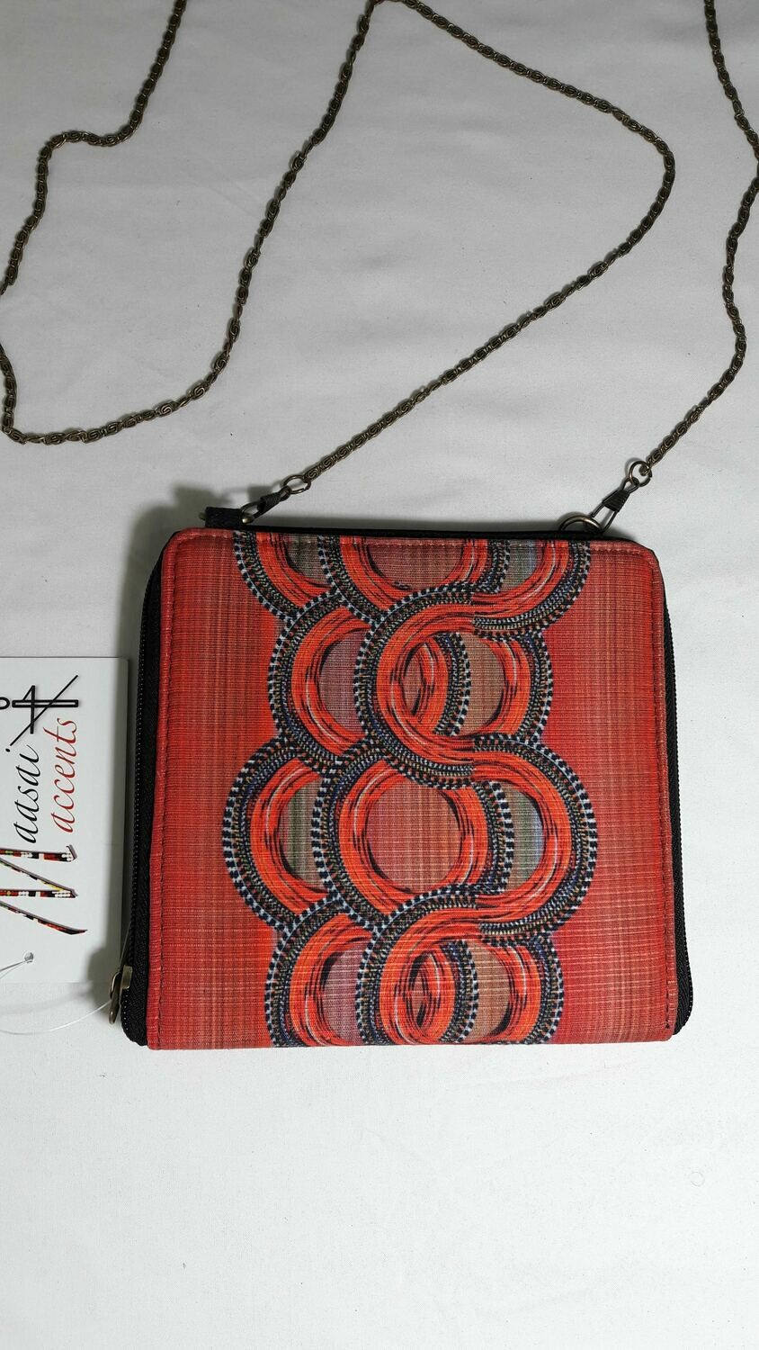 Maasai Accents®, Kitenkela beadwork print , sqaure sling. Abstract beadwork polyester canvas square sling bag, with Kitenkela Maasia beadwork print
