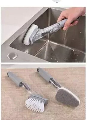 Kitchen cleaning brush with soap applicator.  Multiuse one side brush one side sponge