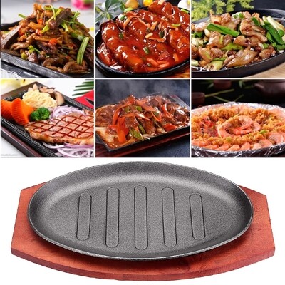 Sizzling plates with wooden base round or oval