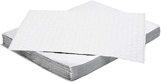 Greese proof paper sheets packing of 100 sheets.  Size  23 X 23cm