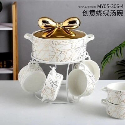 Luxurious marble soup bowl set. Comes with the stand, bowls with handle and a serving bowl.Capacity (bowl) 2200ml and (cups) 350ml. Unique and classy (White)