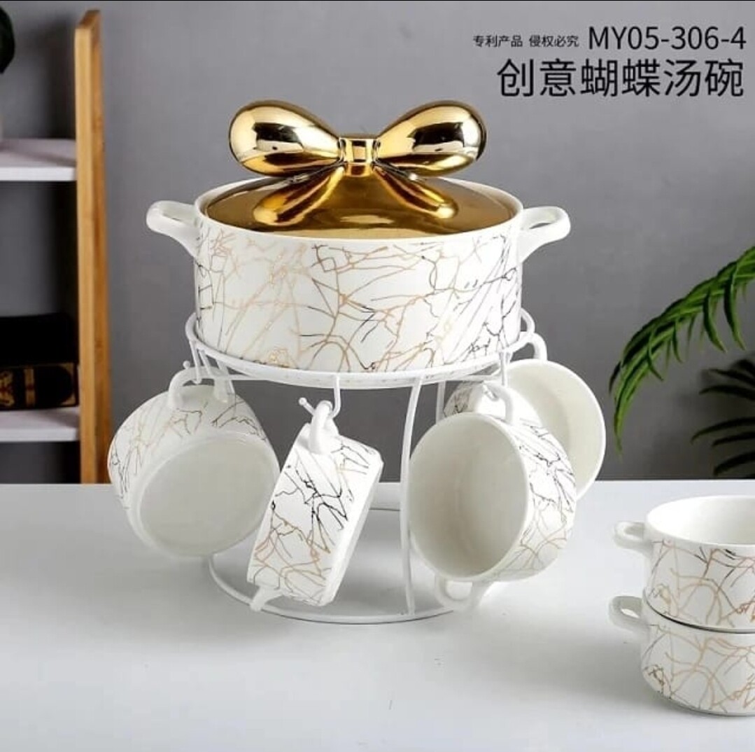 Luxurious marble soup bowl set. Comes with the stand, bowls with handle and a serving bowl.Capacity (bowl) 2200ml and (cups) 350ml. Unique and classy (White)