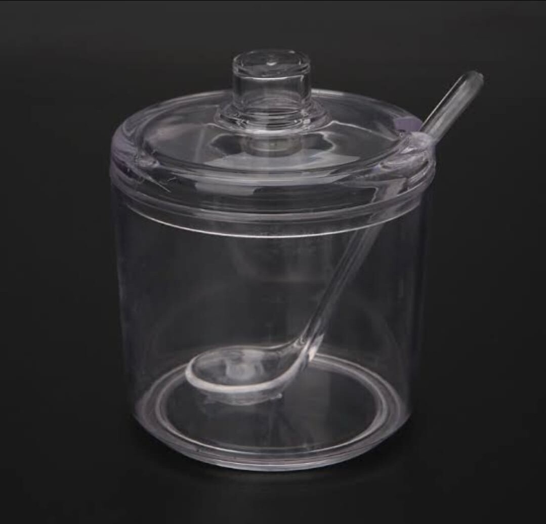 Plastic sugar dish with spoon