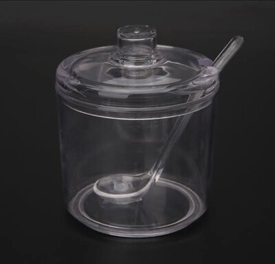 Plastic sugar dish with spoon