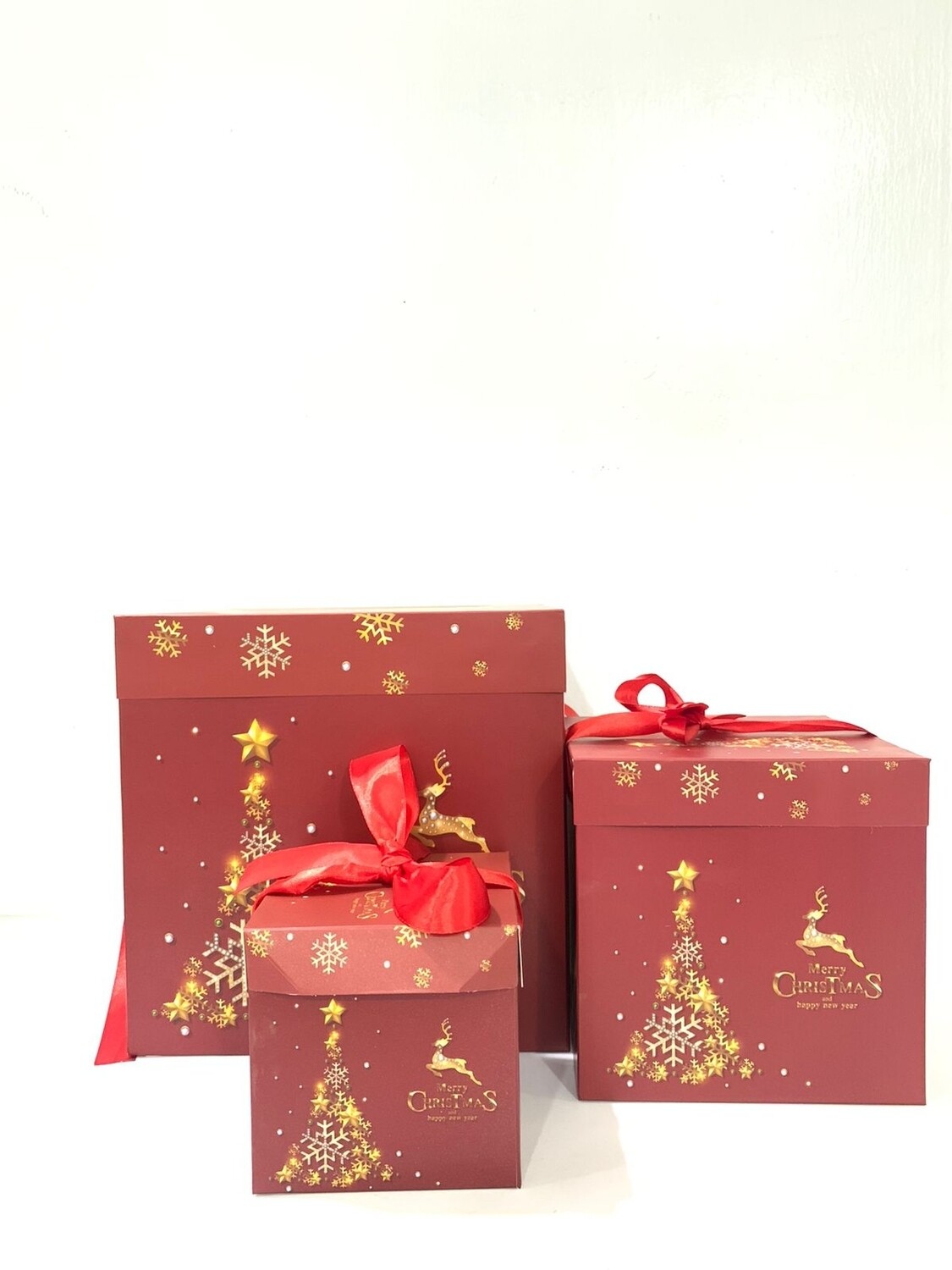 Set of 3 printed Xmas GIft boxes each wirh bow tie. . sizes 10x10, 15x5, 20x20cm