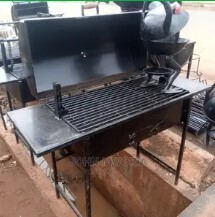 Self-standing Charcoal Barbeque Grill 80x50cm with rolling drum cover.