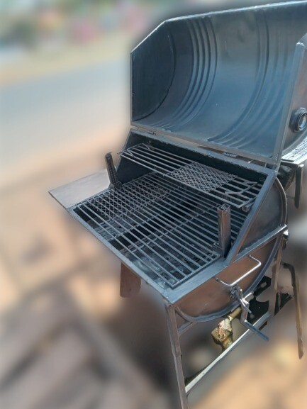 Self-standing Charcoal Barbeque Grill 2 in 1 (main Grill 80x50cm + Top Grill 80x20cm) with rolling drum cover. made in Kenya
