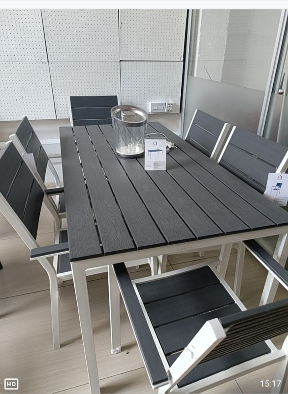 Complete garden furniture set consisting of table and 6 chairs, white metal frame and HPDE slats, teak grey