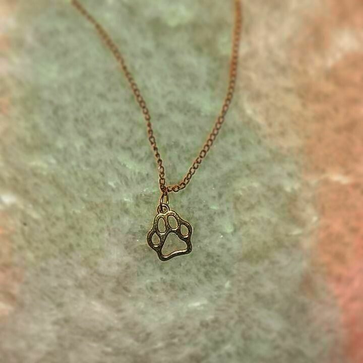 *paw necklace*