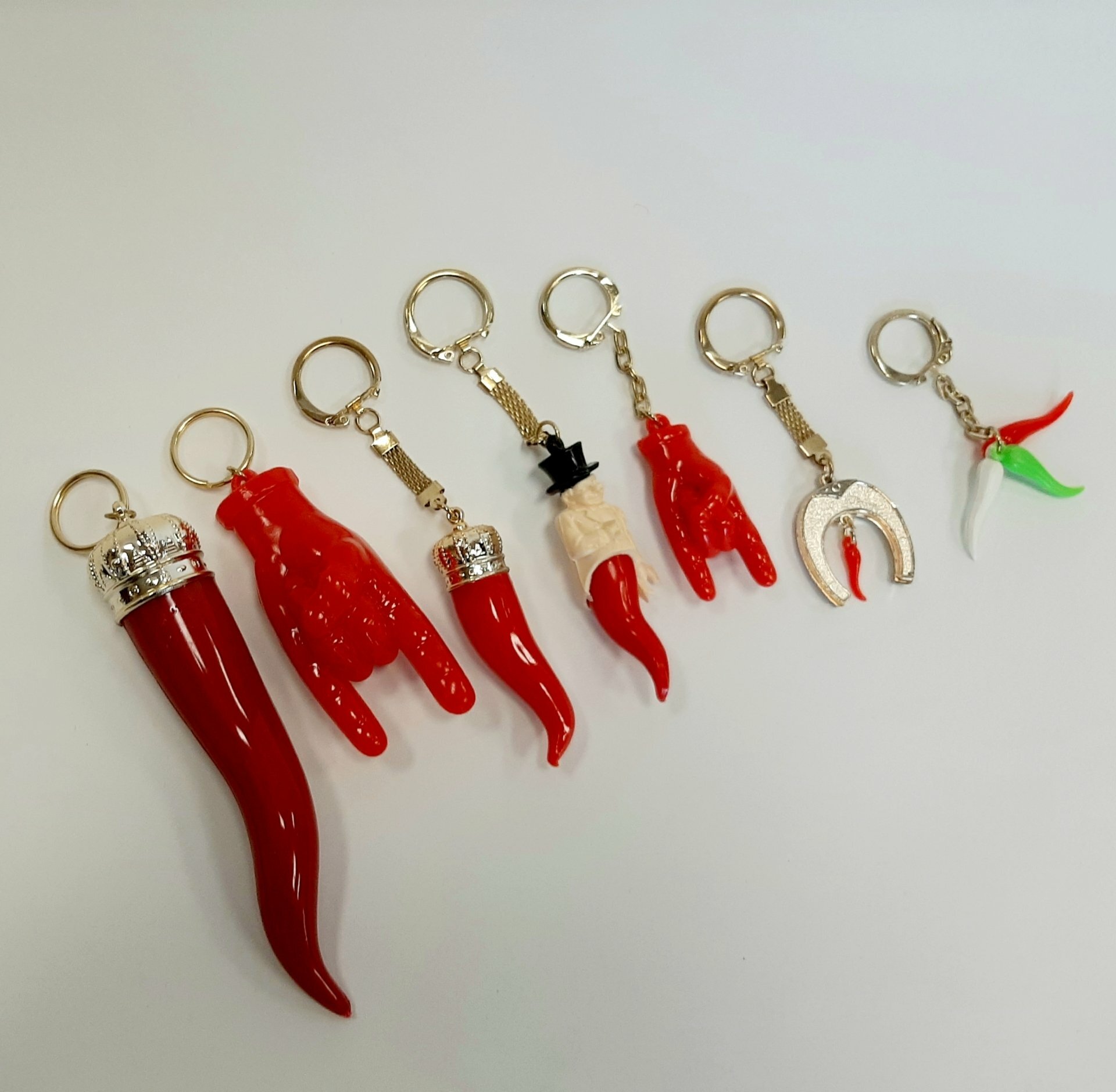 Keychains, cornetti, malocchio and lapel pins