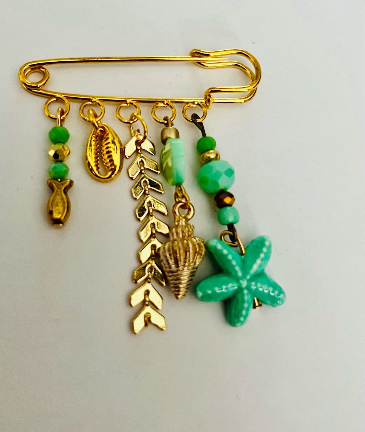 Broche Speld Sea ?