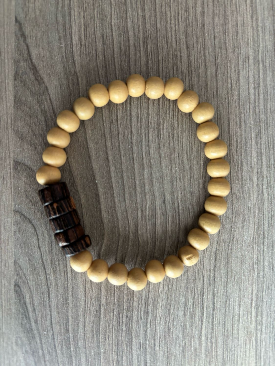 Mannenarmband hout ?