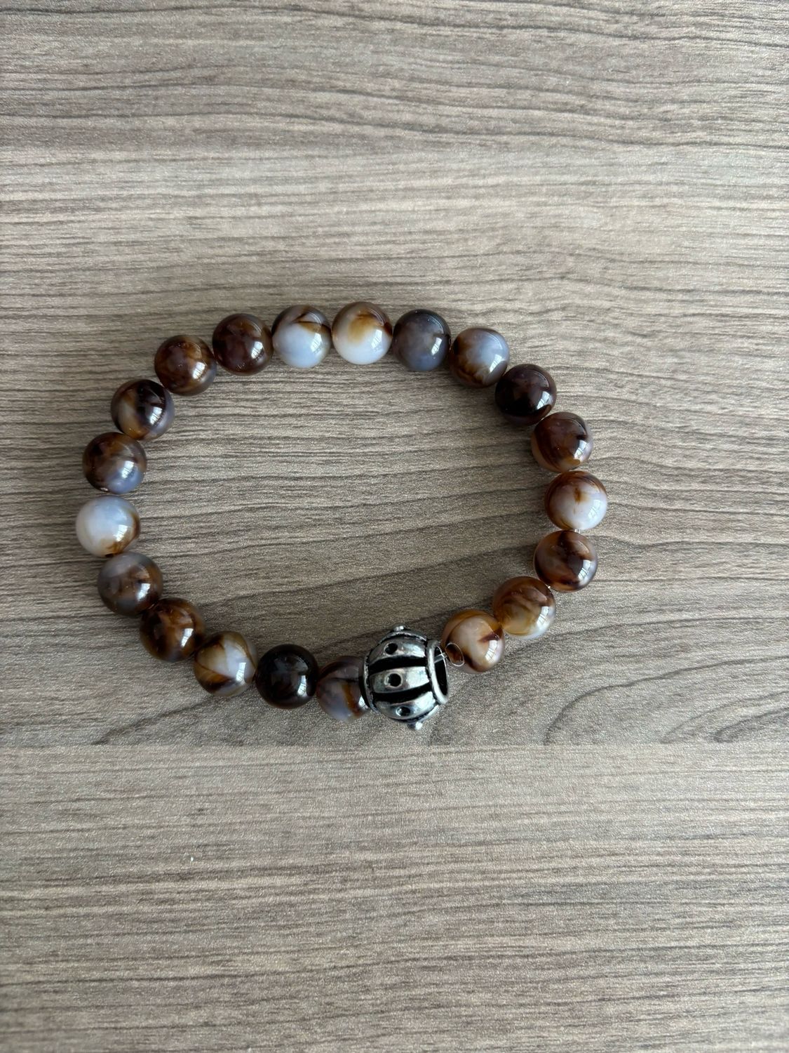 Mannenarmband bruin grote kraal