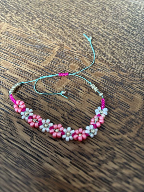 Armband bloem roze ?