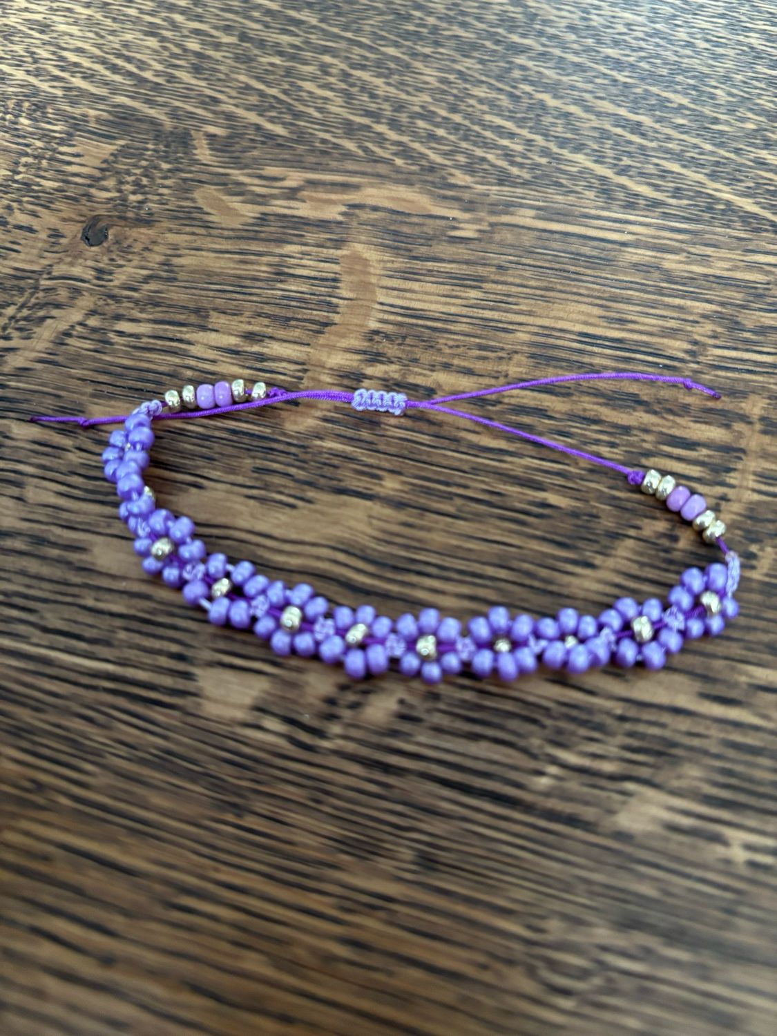 Armband bloem paars