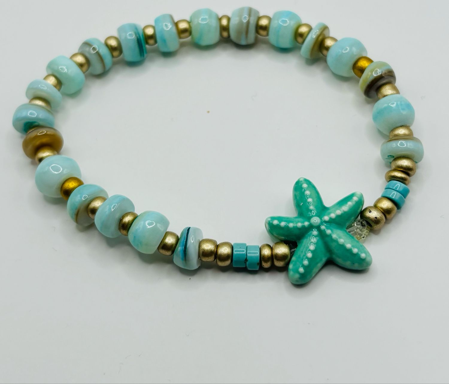 Armband zeester turkoois
