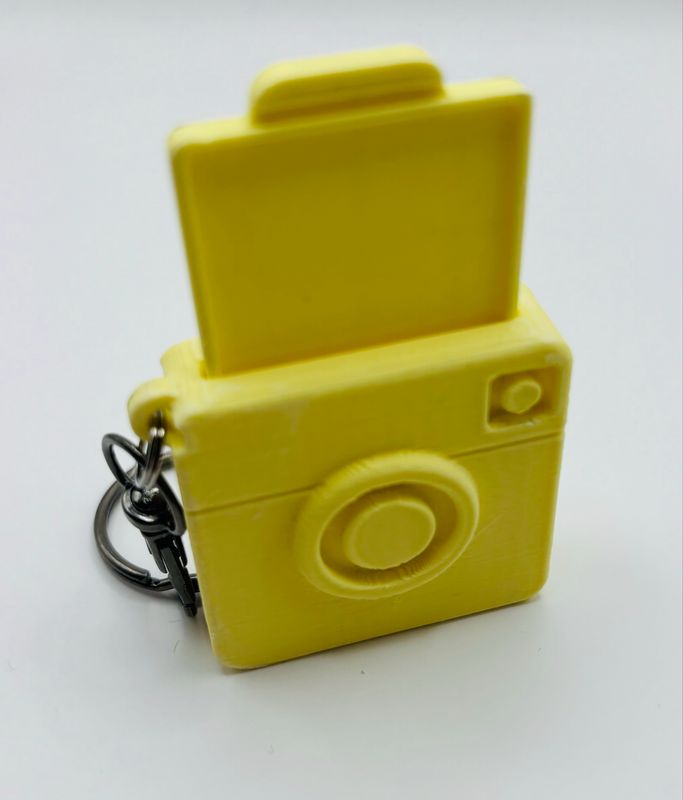 Sleutel hanger fototoestel geel