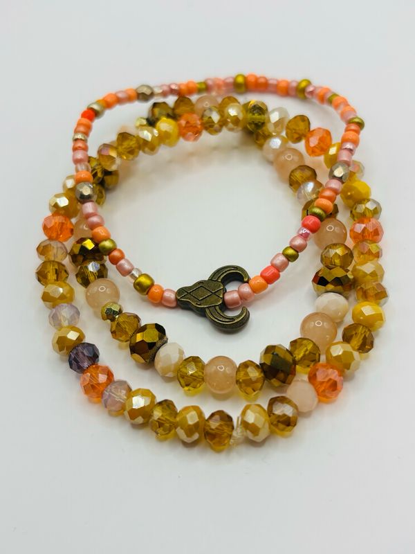 Armbandset facet oranje bruin