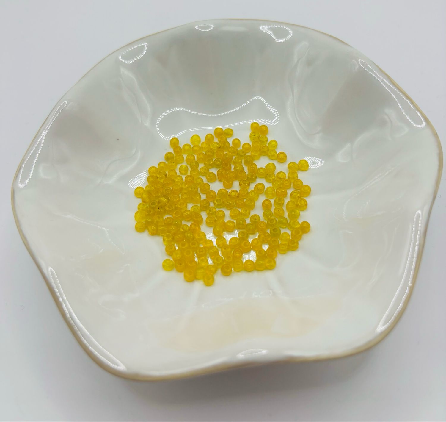 Rocailles 2mm geel doorzichtig 50 gr