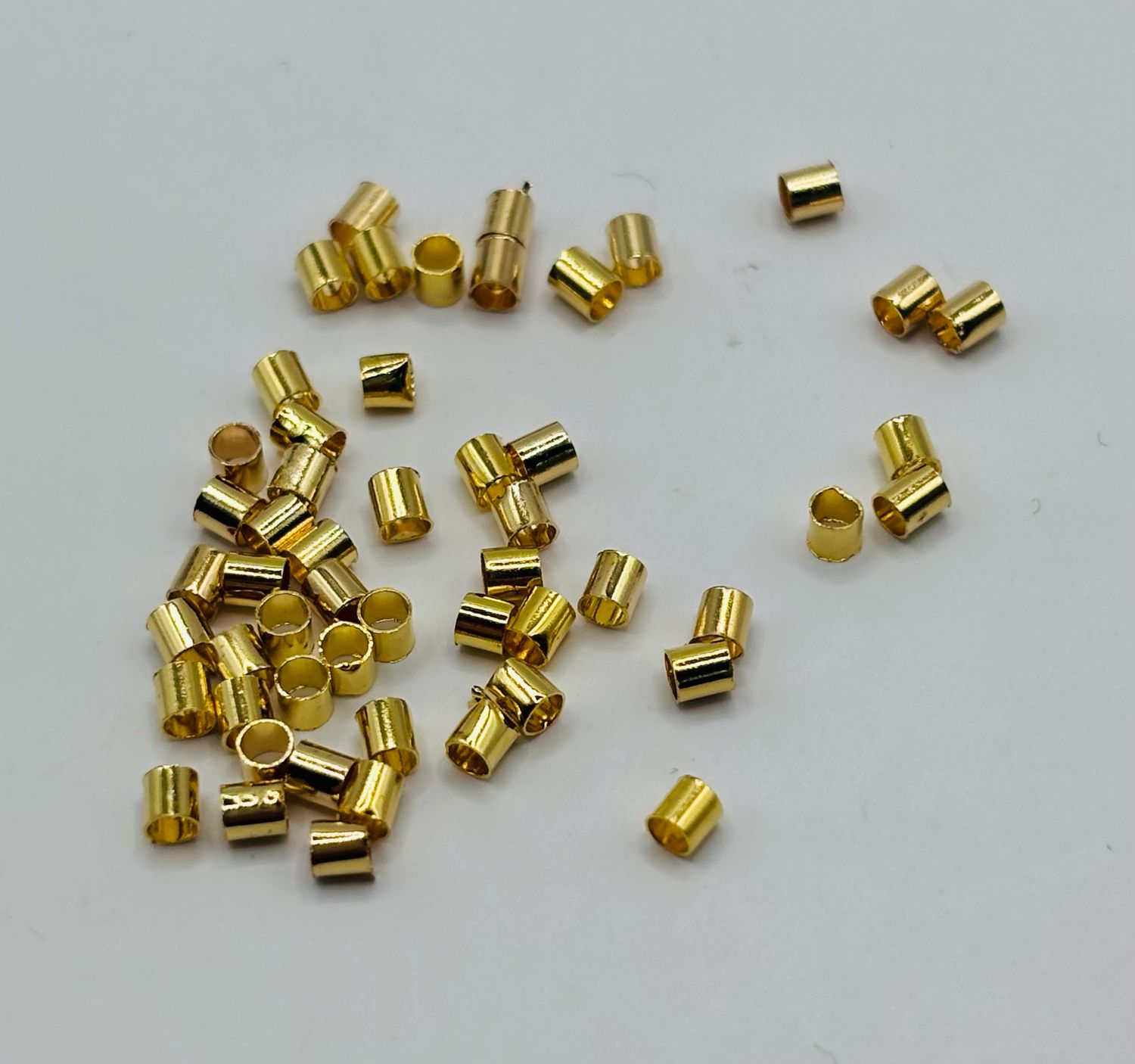 Knijpkralen goud 2mm 100st