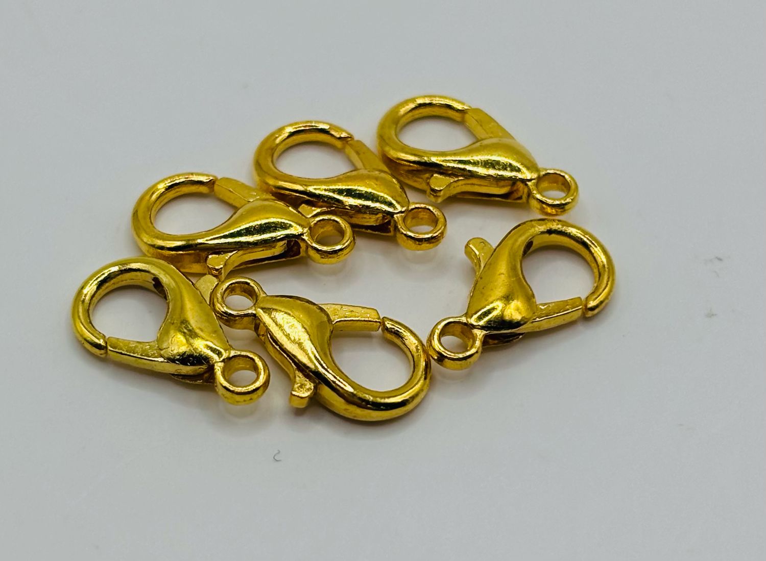 Karabijn slotje goud