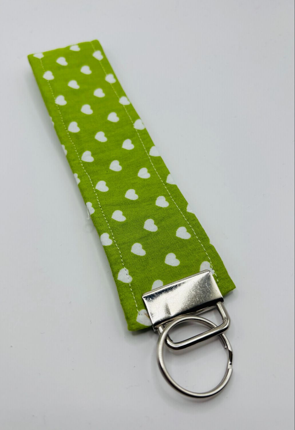 Sleutelhanger stof groen ?