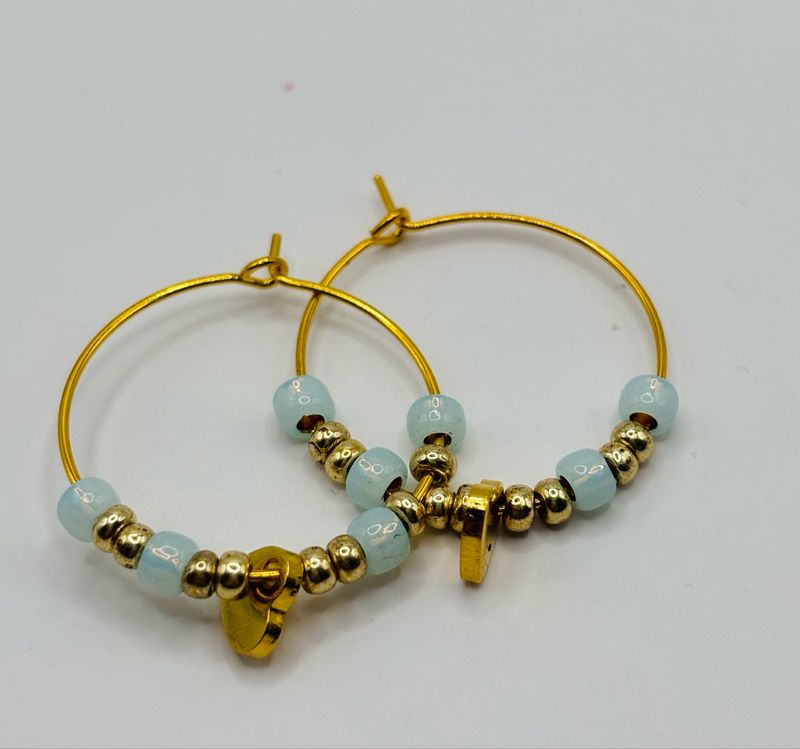 Oorbellen goud hartje blauw