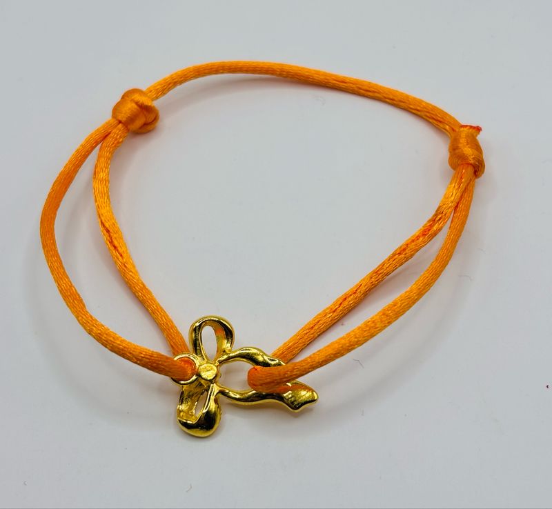 Satinarmbandje strik goud